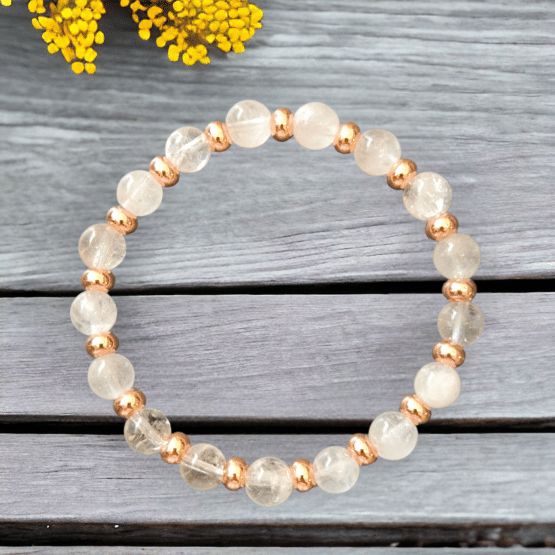 Bracelet Cristal de Roche 8mm + séparateur dorée